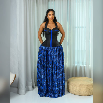 Black corset top paired with blue batik silk pleated long skirt