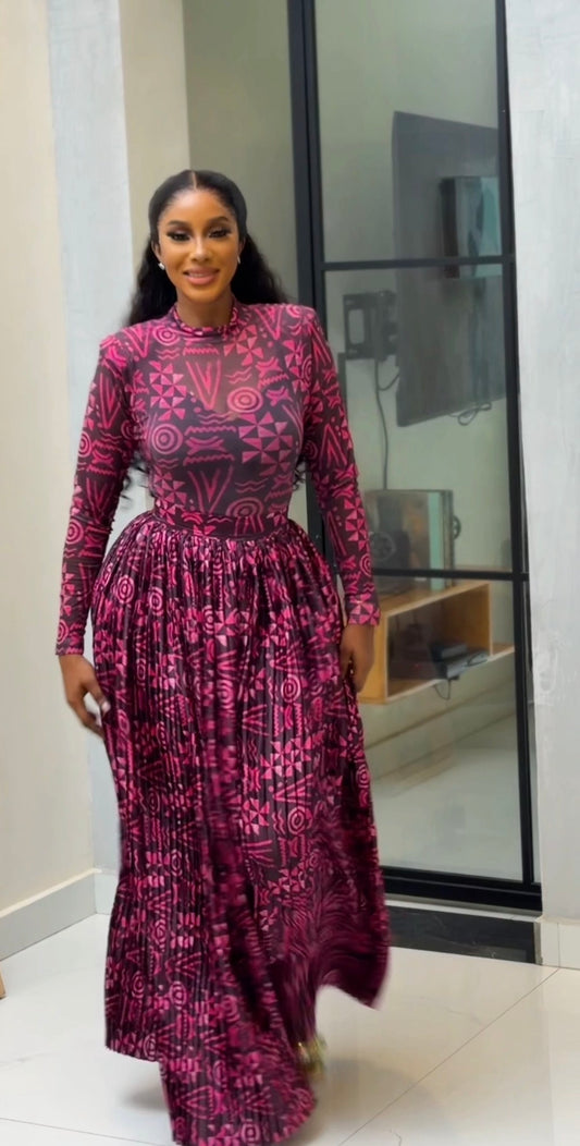 Pink Batik mesh top and a silk pleated long skirt.