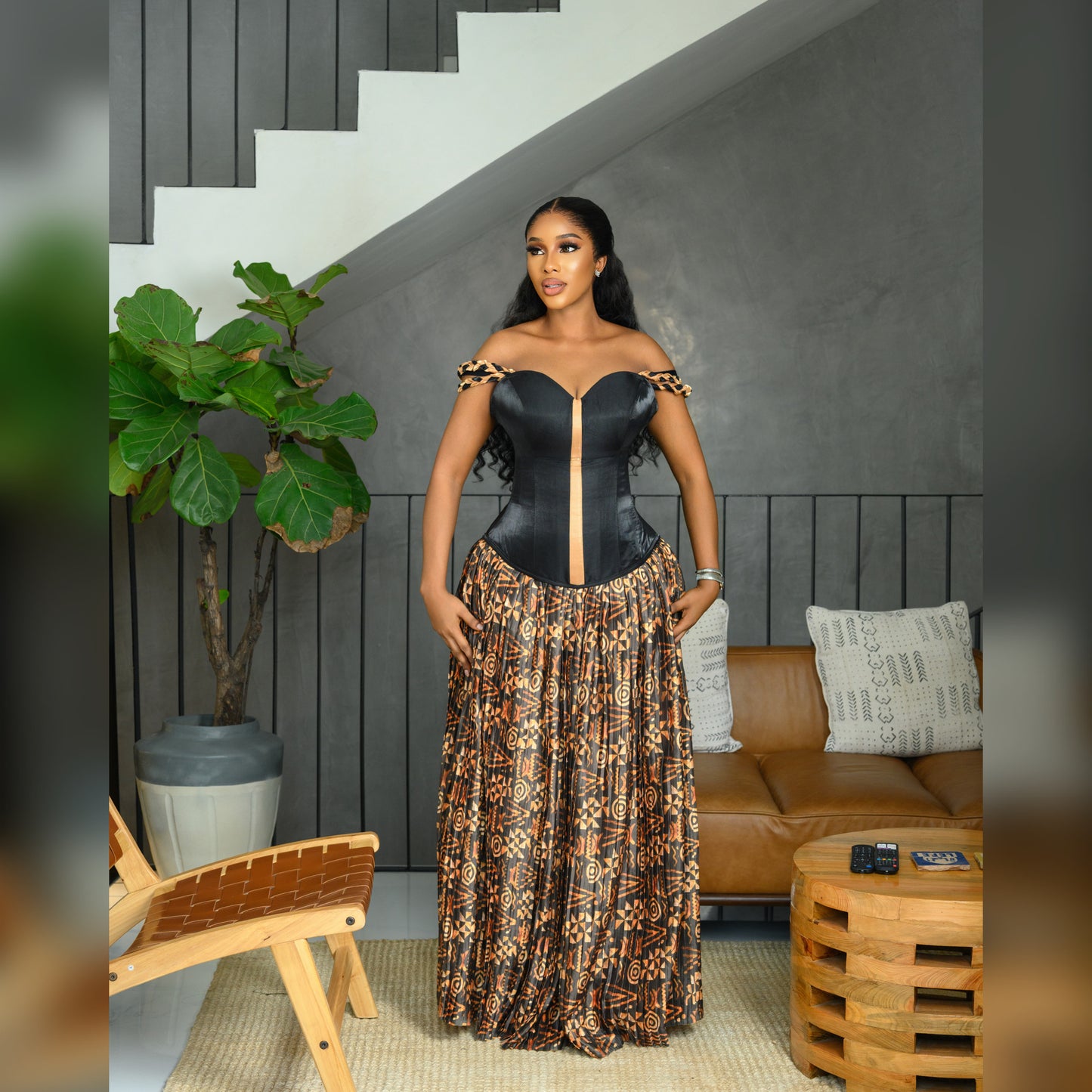 Black corset top and yellow batik silk pleated long skirt