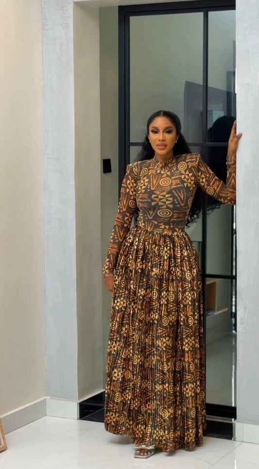 Yellow Batik mesh top and a silk pleated long skirt