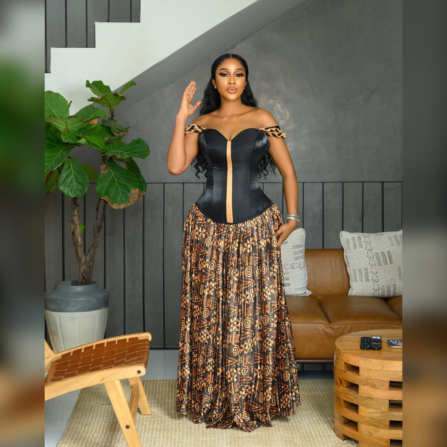 Black corset top and yellow batik silk pleated long skirt