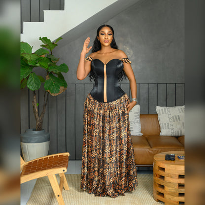Black corset top and yellow batik silk pleated long skirt