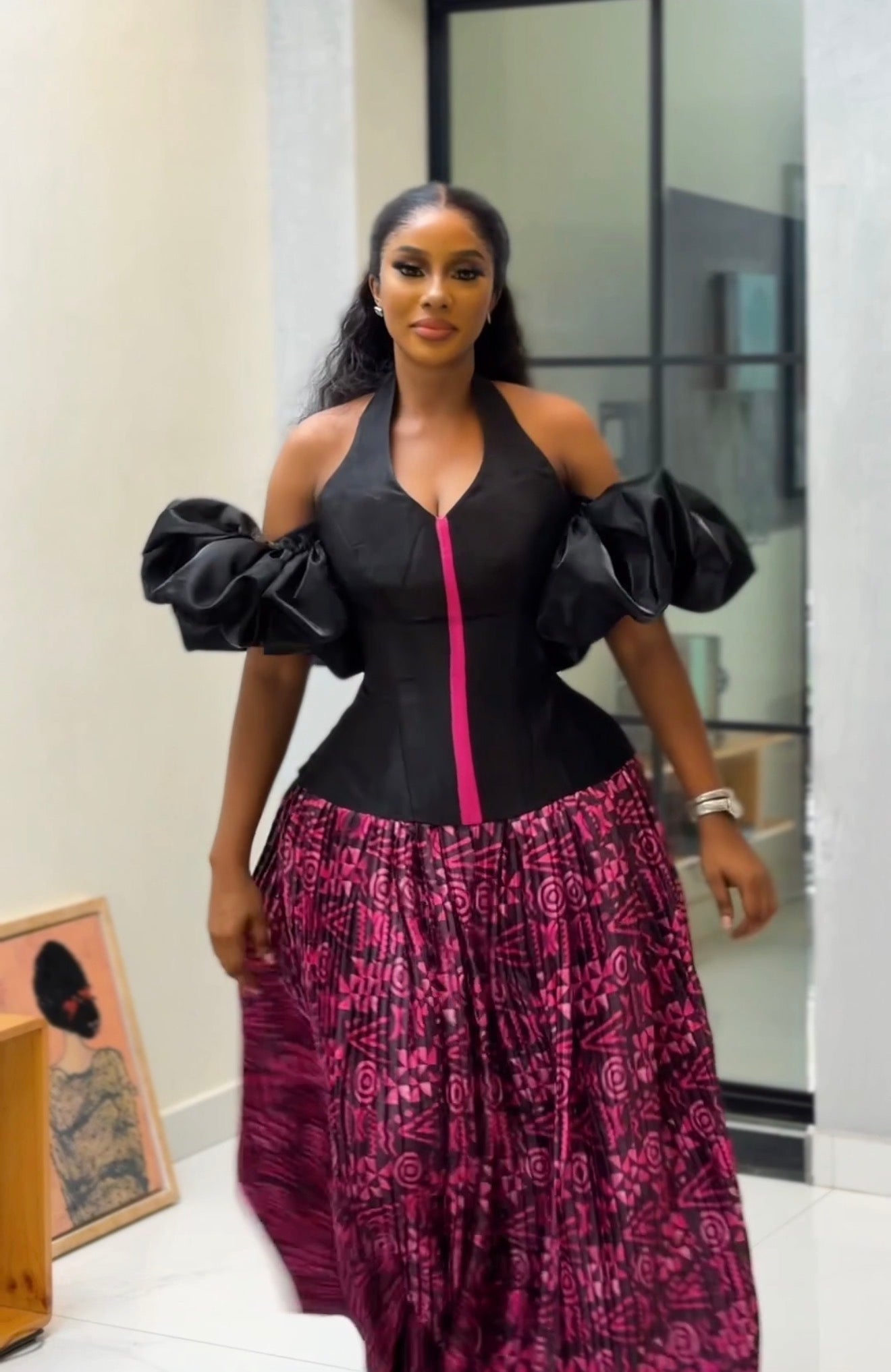 Black corset top and pink batik silk pleated long skirt