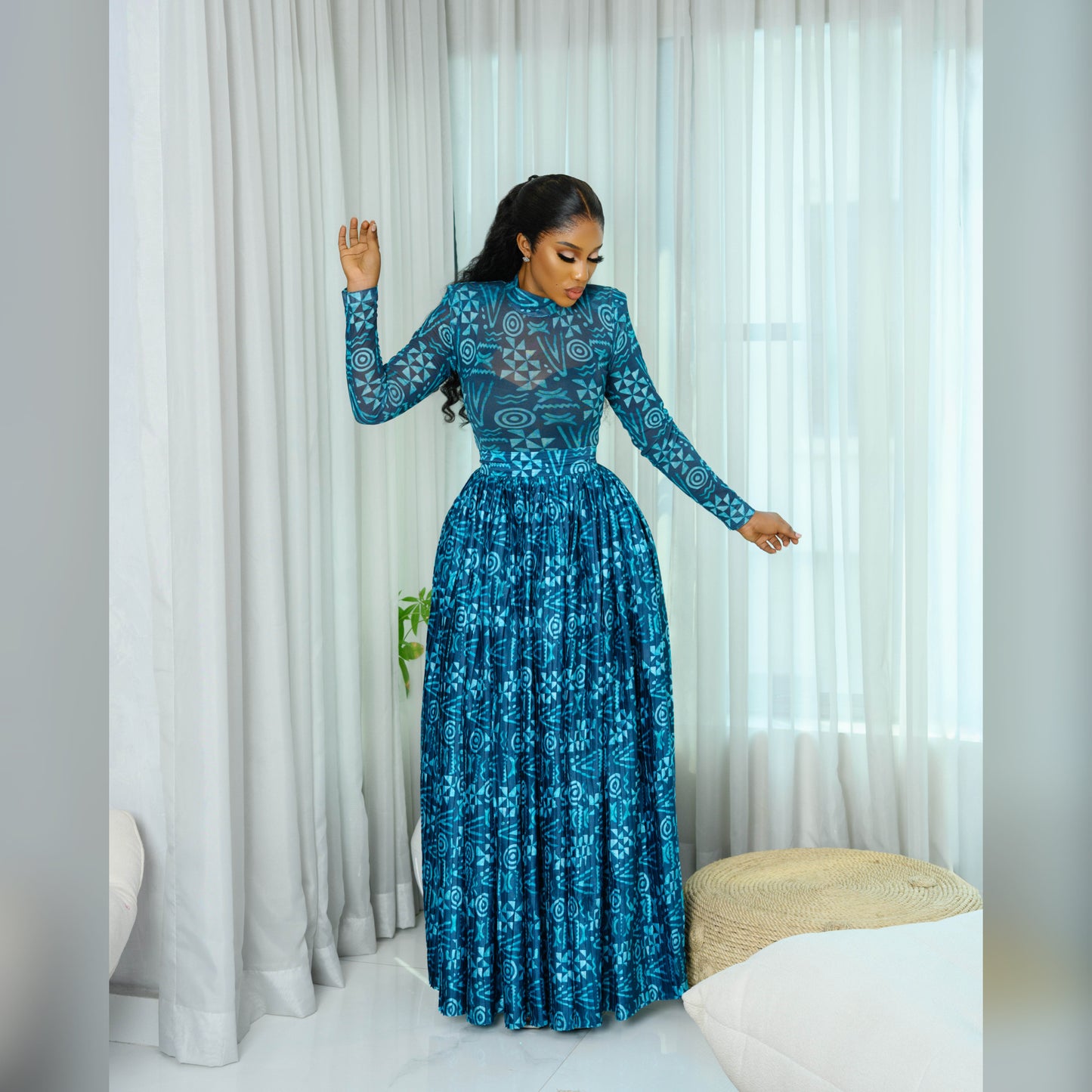 Green Batik mesh top and a silk pleated long skirt