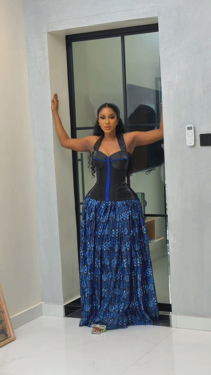 Black corset top paired with blue batik silk pleated long skirt