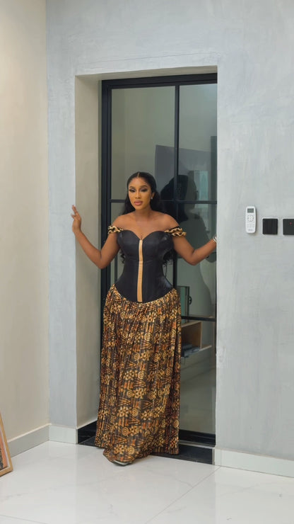 Black corset top and yellow batik silk pleated long skirt